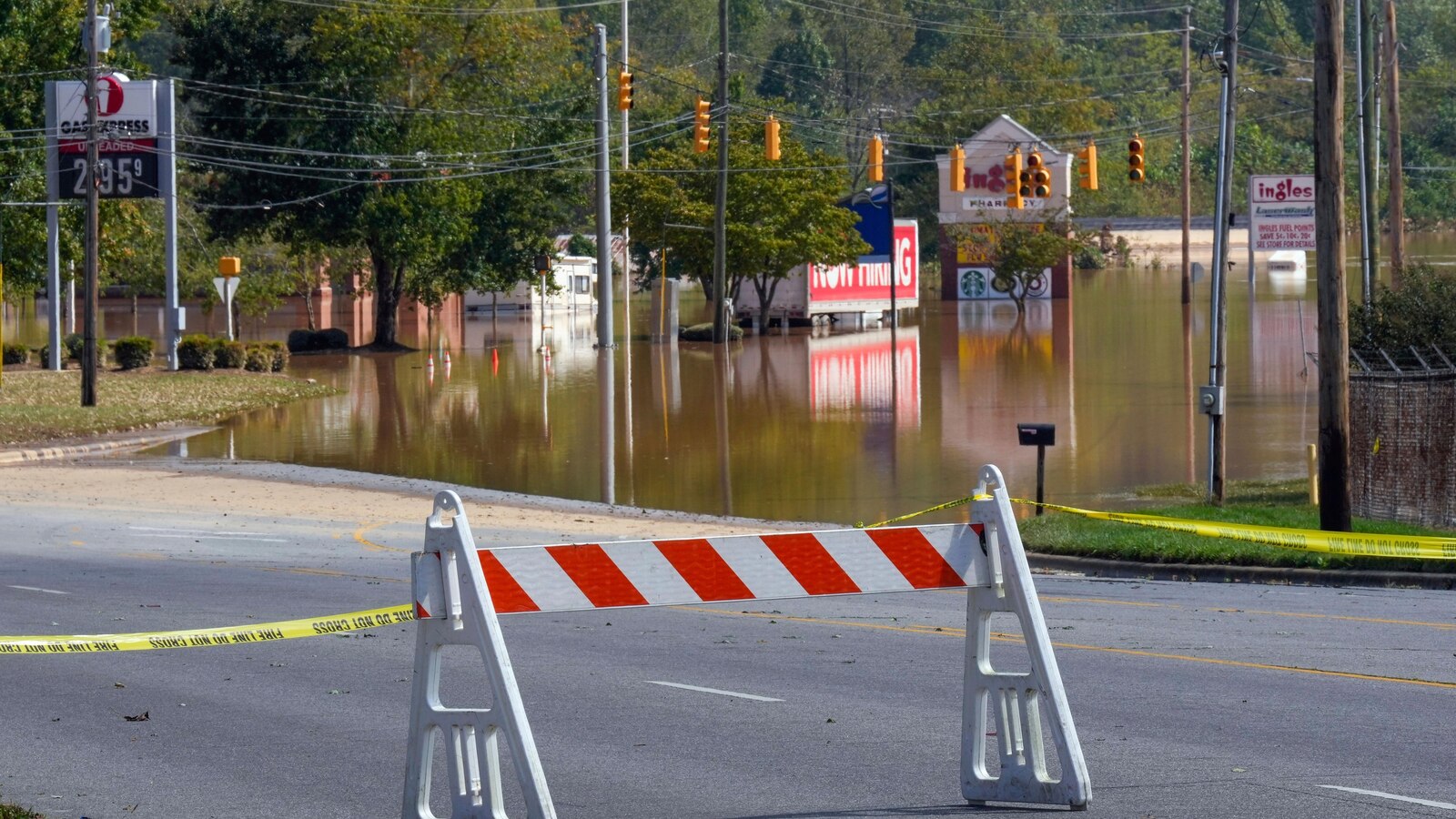 Supplies rushed to communities isolated by Helene as death toll rises to nearly 100