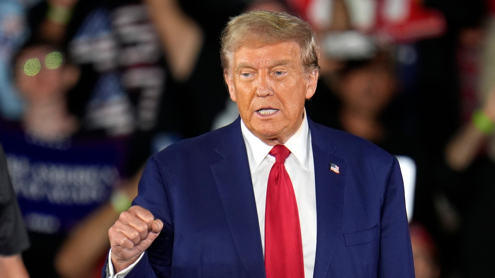 Trump lists his grievances in a Wisconsin speech intended to link Harris to illegal immigration